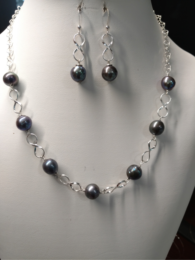 Grey Fresh Water Pearls adorned with Sterling Silver